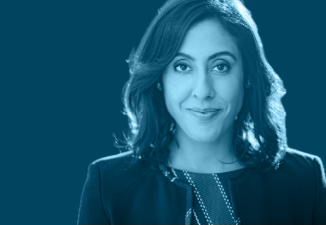 blue tinted photo of Erica Dhawan, International expert on body language and leadership