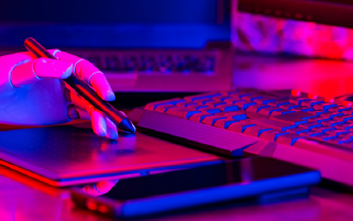 A robotic hand using a stylus on a digital tablet, symbolizing AI-driven copywriting, automation, and content creation efficiency.